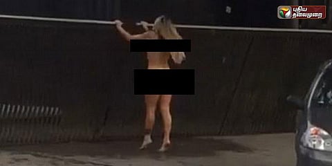 கார் டீலர் வீட்டின் முன் நிர்வாணப் போராட்டம் - பெண் அதிரடி