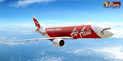 நடுவானில் விமானத்தின் கதவை திறக்க முயன்ற இளைஞர்!