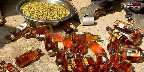மதுபாட்டில்களை உடைத்து ஆர்ப்பாட்டம்