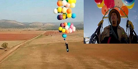 100 பலூன்களின் உதவியுடன் வானில் பறந்த நபர்