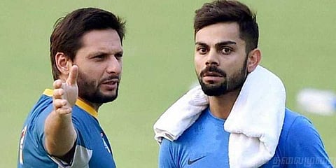 தோனி, கோலி கேப்டன்ஷிப் எப்படி?: அஃப்ரிடி கருத்து