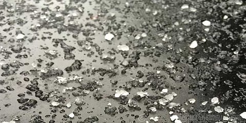 கோடையில் கொட்டிய ஆலங்கட்டி மழை