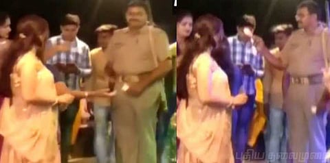 நடன அழகிகளுக்கு ரூபாய் நோட்டுகளை வீசிய போலீஸ்