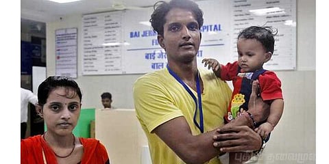 காதணியை முழுங்கிய குழந்தை!