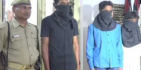 உ.பி. போலீஸ் தேர்வில் ஹை-டெக் மோசடி: 14 பேர் கைது