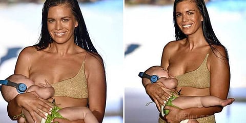 5 மாத குழந்தைக்கு பால் ஊட்டியபடி கேட்வாக் செய்த மாடல்..!