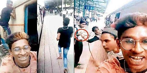 ரயிலில் தொங்கியபடி செல்ஃபி எடுத்த இளைஞர்கள்