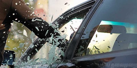 கார் கண்ணாடியை உடைத்து கொள்ளை - கண்டுபிடிக்கும் முனைப்பில் காவல்துறை