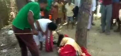 வேறு சாதி ஆணை விரும்பியதால் இளம்பெண்ணை கட்டிவைத்து தாக்கிய ஊர்மக்கள்