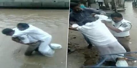 அடிப்பட்ட முதியவரை முதுகில் தூக்கிச்சென்று உதவிய காவலர் - வைரல் வீடியோ