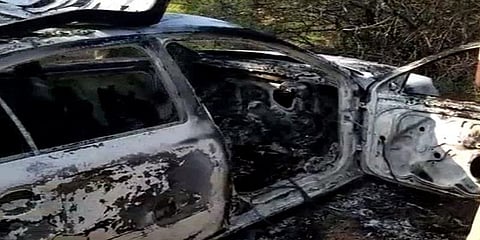 காட்டுக்குள் காரோடு சேர்ந்து எரிந்த நிலையில் பெண்ணின் உடல்!