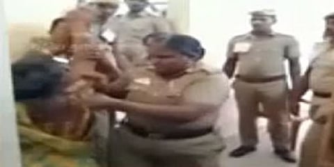 பெண் சுயேச்சை வேட்பாளர் மீது போலீசார் தாக்குதல்
