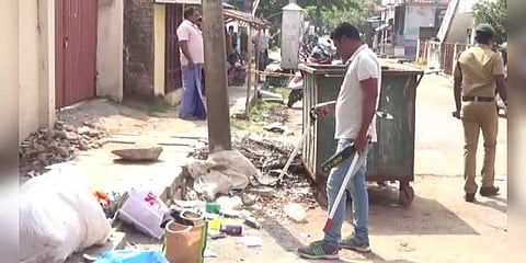 குப்பை தொட்டிக்குள் இருந்து திடீரென வெடித்த நாட்டு வெடிகுண்டு - ஒருவர் படுகாயம்