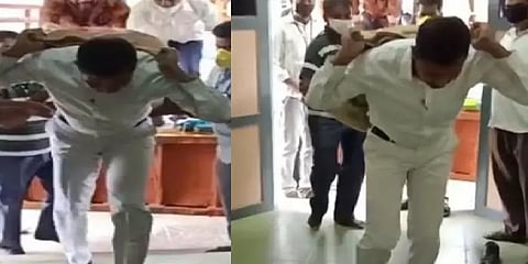 நிவாரண அரிசி மூட்டைகளை முதுகில் சுமந்த வட்டாட்சியர் - குவியும் பாராட்டு!