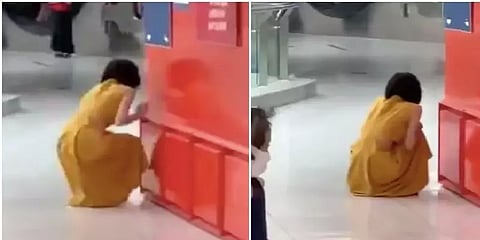 கொரோனா உறுதியானதை அறிந்து வணிக வளாகத்தில் கதறி அழுத பெண் - வைரல் வீடியோ