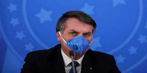 பிரேசில் அதிபர் போல்சனாரோவுக்கு கொரோனா .. முககவசம் அணிந்தவாறு அறிவித்தார்..!