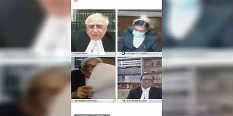 ஆன்லைன் வழக்கு விசாரணையின் போது புகை பிடித்த மூத்த வழக்கறிஞர் : வைரலாகும் வீடியோ