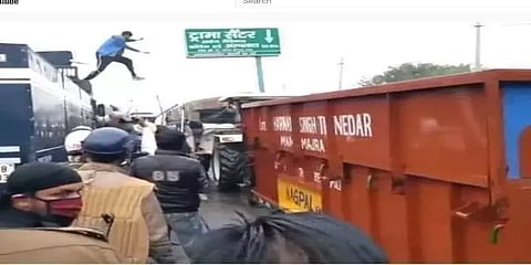 'டெல்லி சலோ' - போலீஸ் வேனில் தாவிய நவ்தீப்... தடுப்புகளைத் தகர்த்தெறிந்த விவசாயிகள்!