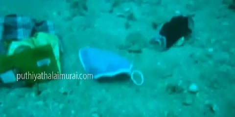 மீன்களுக்கு மத்தியில் ஆழ்கடலில் குவிந்துள்ள முகக்கவசங்கள்: வீடியோ!