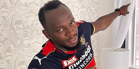 ஆர்.சி.பி. ஜெர்சியில் உசைன் போல்ட்.. ரெஸ்பாண்ட் செய்த கோலி, ஏபிடி