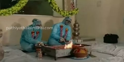 ம.பி: கொரோனாவால் பாதிக்கப்பட்ட மணமகன்; முழு கவச உடை அணிந்து திருமணம்