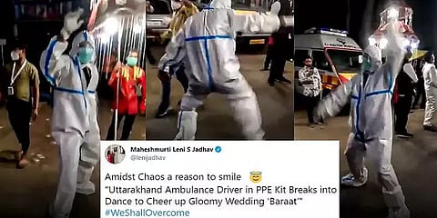 மன அழுத்தம் போக்க, பி.பி.இ உடையிலேயே நடனமாடிய ஆம்புலன்ஸ் டிரைவர்!