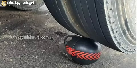 அரியலூர்: பேருந்தின் சக்கரத்தில் சிக்கியும் தரமான தலைக் கவசத்தால் உயிர்பிழைத்த இளைஞர்