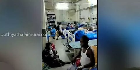 புதுச்சேரியில் கொரோனா நோயாளிகளை தரையில் அமர வைத்து சிகிச்சை
