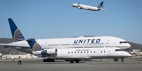 அமெரிக்காவில் அதிகரிக்கும் கொரோனா பரவல்: நூற்றுக்கணக்கான விமான சேவைகள் ரத்து