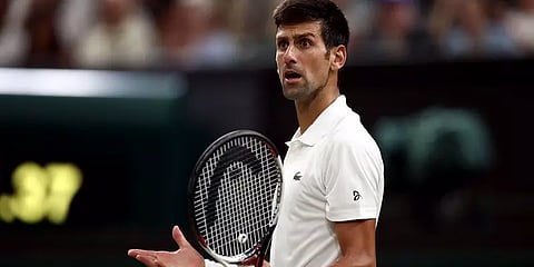 ரத்து செய்யப்பட்ட ஜோக்கோவிச் விசா: நாடாளுமன்றம் முன்பு திரண்ட போராட்டக்குழு