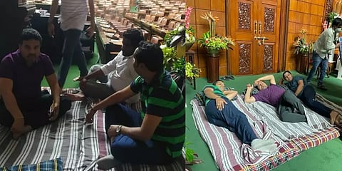 காவி கொடி குறித்து சர்ச்சை பேச்சு: சட்டப்பேரவைக்குள் உறங்கி காங்., எம்.எல்.ஏ.க்கள் தர்ணா