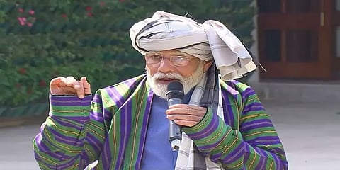 ஆப்கனின் பாரம்பரிய உடையை அணிந்த பிரதமர் மோடி!