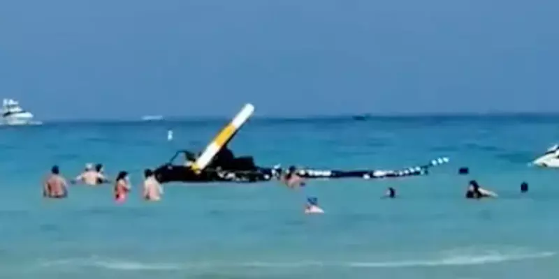 மியாமி கடற்கரையில் மக்கள் குளித்துக்கொண்டிருந்த பகுதியில் திடீரென விழுந்த ஹெலிகாப்டர்!