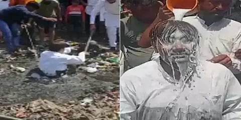 சாக்கடைக்குள் இறங்கி சுத்தம் செய்த கவுன்சிலருக்கு பால் அபிஷேகம் செய்த தொண்டர்கள்