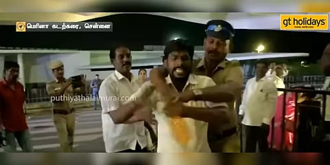 ஓபிஎஸ்க்கு ஆதரவாக ஜெ. நினைவிடத்தில் ஒப்பாரி வைத்து தீக்குளிக்க முயன்ற அதிமுக தொண்டர்!