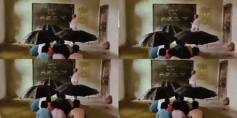 ம.பி: வகுப்பறைக்குள் பெய்த மழை- குடை பிடித்தபடி பாடம் கவனித்த மாணவர்கள்; வீடியோ வைரல்!