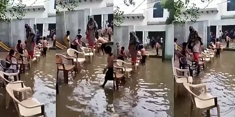 உ.பி: மாணவர்கள் அமைத்த நாற்காலி பாலத்தில் மழைநீர் படாமல் சொகுசாக சென்ற ஆசிரியை சஸ்பெண்ட்!