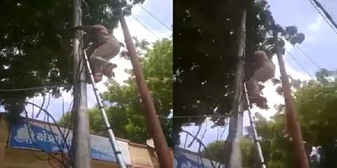 “யாருகிட்ட ஃபைன் கேக்குறீங்க” : போலீசாருக்கே தண்ணி காட்டிய EB லைன்மேன்!