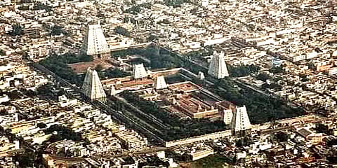 ஸ்ரீரங்கம் கோவிலின் 1 கி.மீ சுற்றளவில் கட்டடங்கள் கட்ட அனுமதி வழங்கியது எப்படி?–நீதிமன்றம்