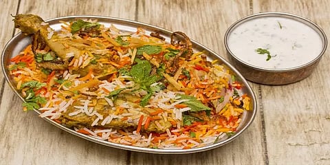 பிரியாணியில் எலும்புத் துண்டு இருந்ததால் போலீசை நாடிய நபர்.. மேனேஜர் மீது பாய்ந்த FIR!