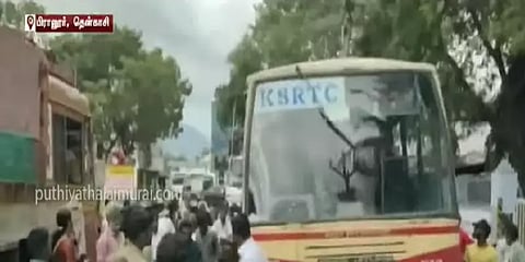 பேருந்து - டிரக் ஓட்டுனர்களிடையே இடையே தகராறு.. கேரள எல்லையில் ஸ்தம்பித்த போக்குவரத்து!