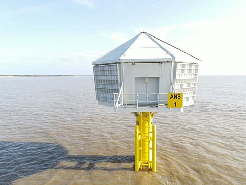 An offshore artificial nesting platform standing above coastal waters as part of marine conservation infrastructure.