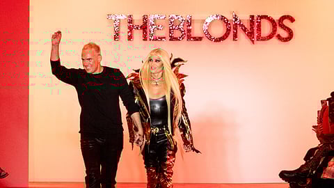Designers David Blond (left) and Phillipe Blond (right) celebrate the close of the show.