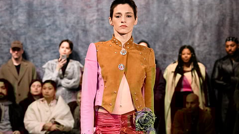 A model walks the runway at Lou Dallas A/W 2024 during NYFW.