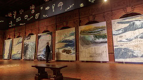 Enrique Martínez Celaya examines his works exhibited for "The Word-Shimmering Sea," currently on display at New York City's Hispanic Society Museum and Library.