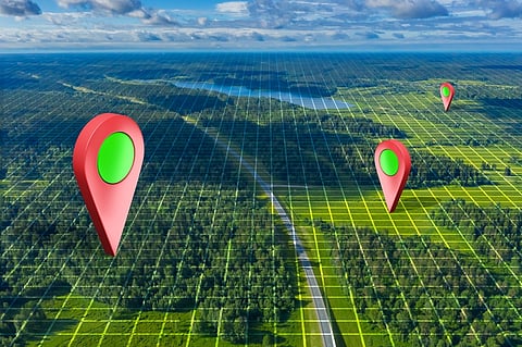two map pins on landscape