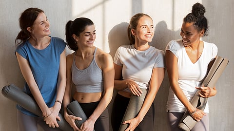 Women Waiting for their Yoga Class to Start