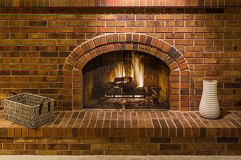 Should You Choose Brick Veneer or Real Brick for Traditional Fireplaces?