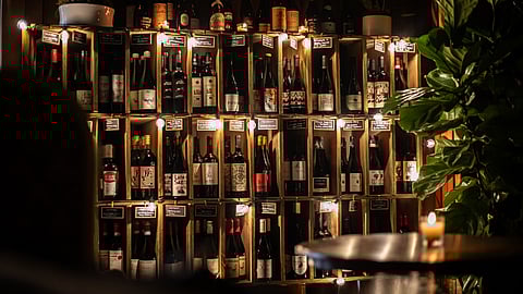 Wine Collection on Display at Magie Wine Bar