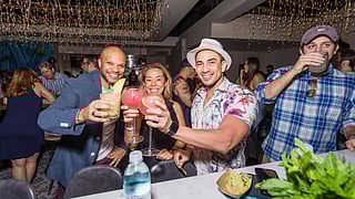 Guests enjoying drinks at COYO Taco